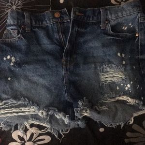 dark blue ripped jean shorts
